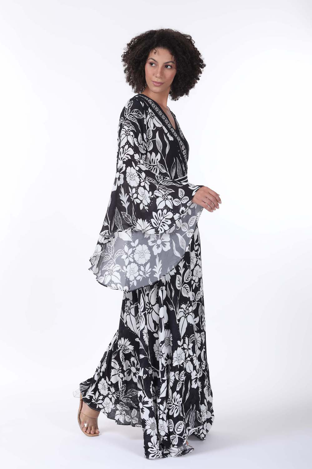 Side view of the black and white AVANTI - DAISY DRESS Modern design with Viscose fabric