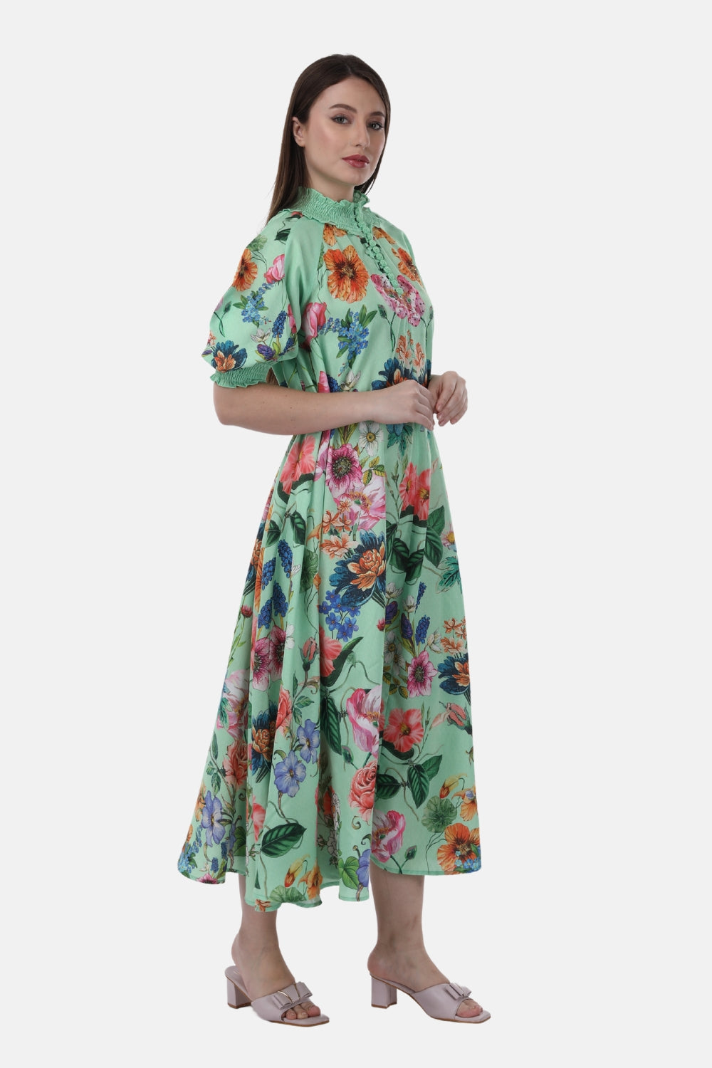 Side angle of the Bondi Resortwear Amour Gardenia Alka Dress showing its soft flowing summer movement