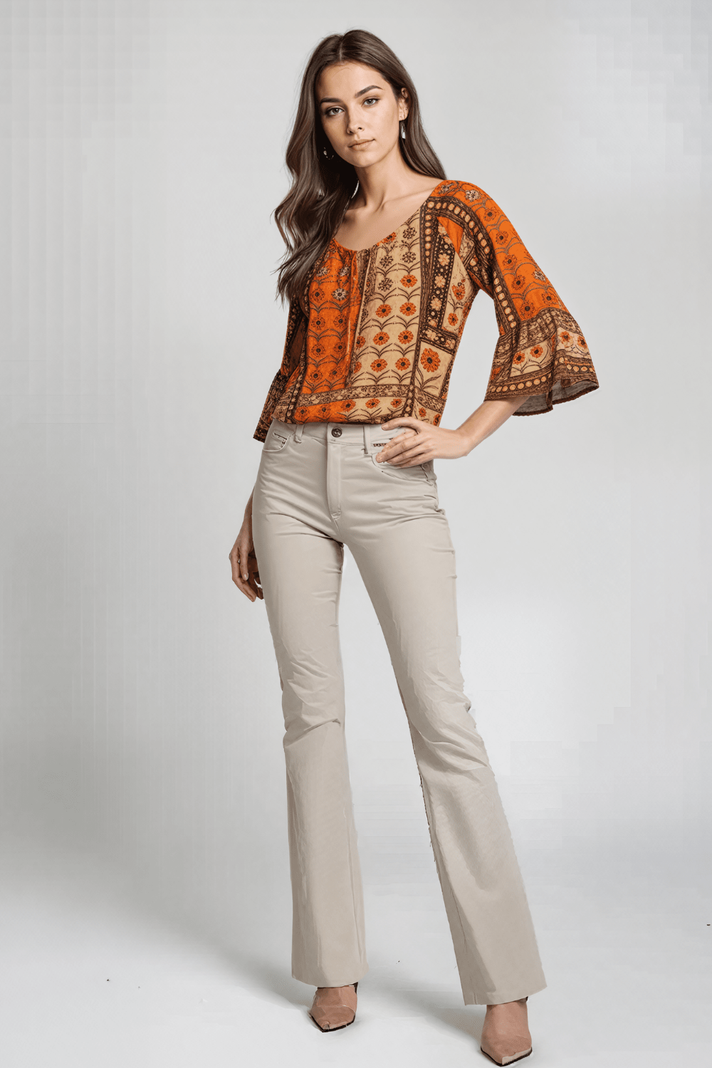 Model wearing the Bondi Resortwear Mahagony Boho Top styled as elegant coastal resort wear in Australia