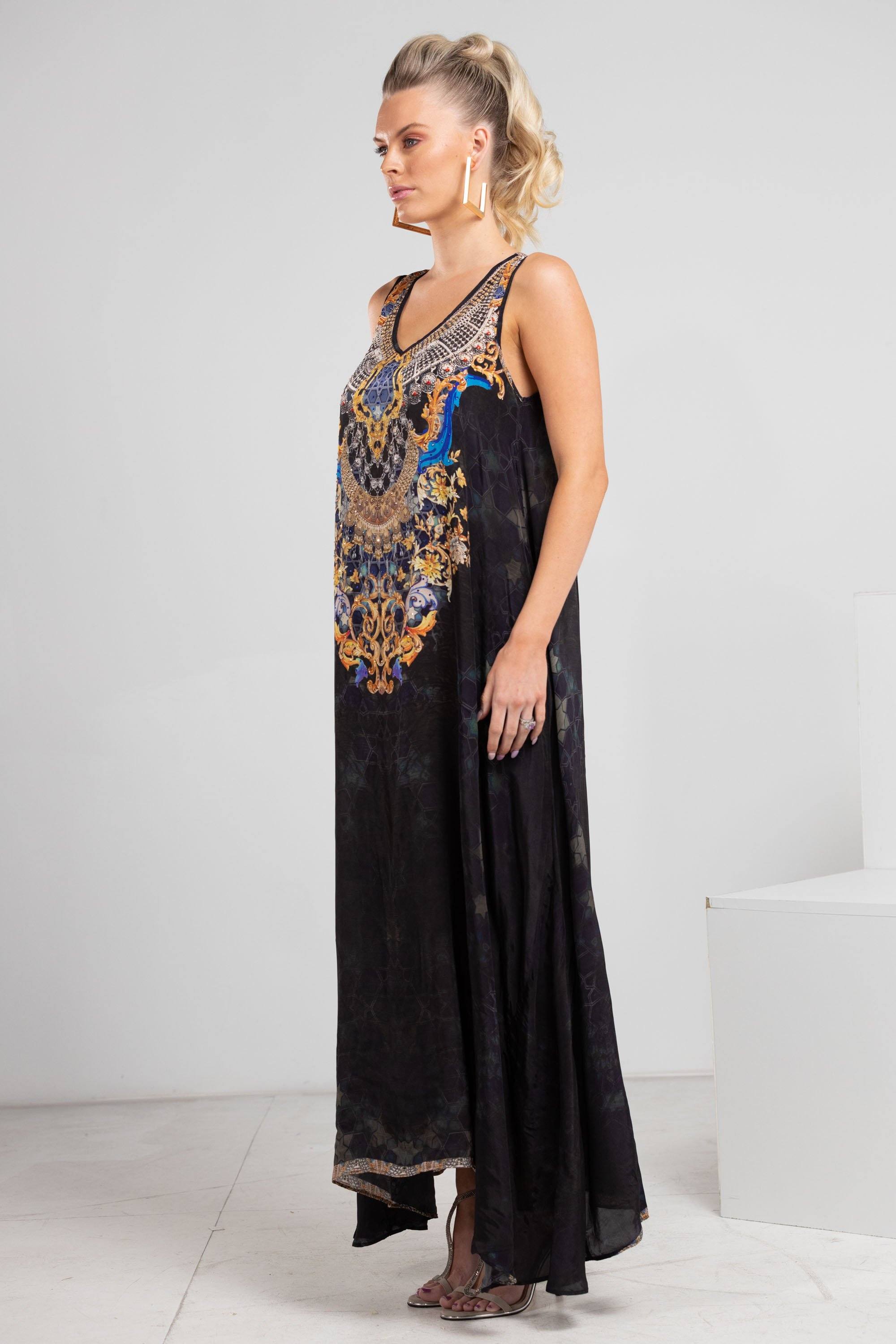 Model twirling in the Midnight in Paris Flowing Maxi Dress showing feminine movement and summer charm