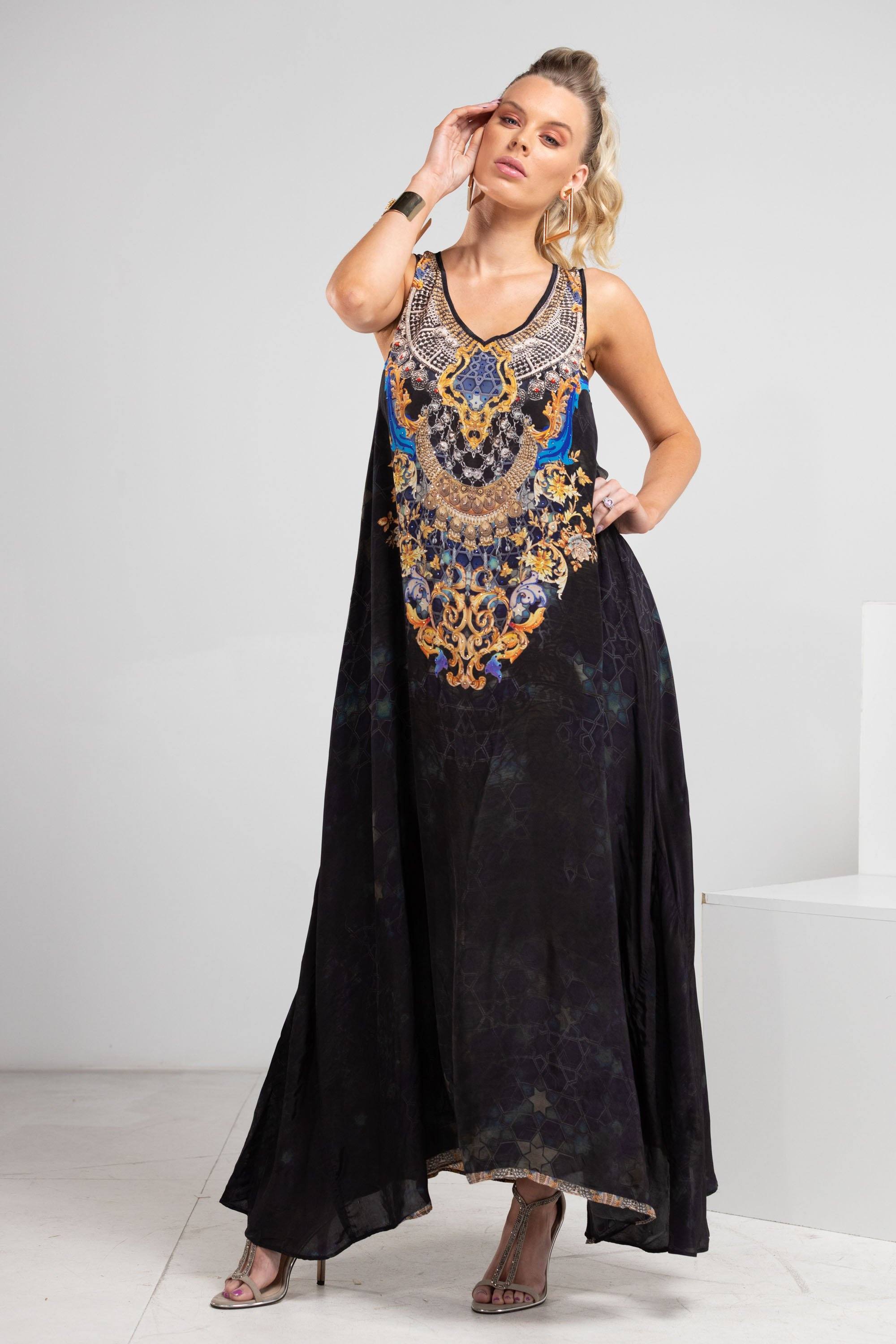 Model posing in the Midnight in Paris Maxi Dress showcasing soft movement and coastal elegance