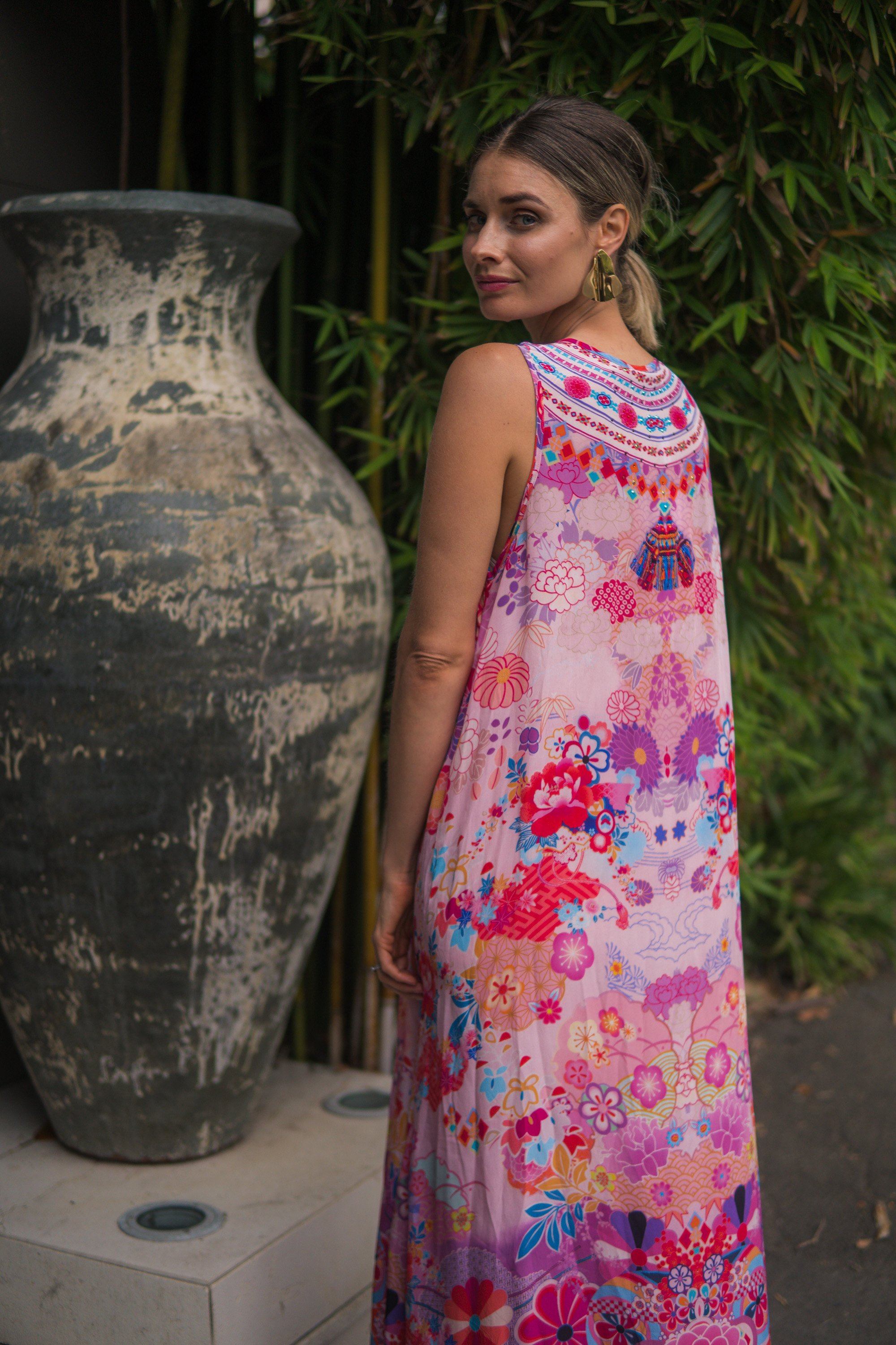 Bondi Resortwear Cherry Blossom Maxi Dress captured in a bright studio setting for coastal summer fashion