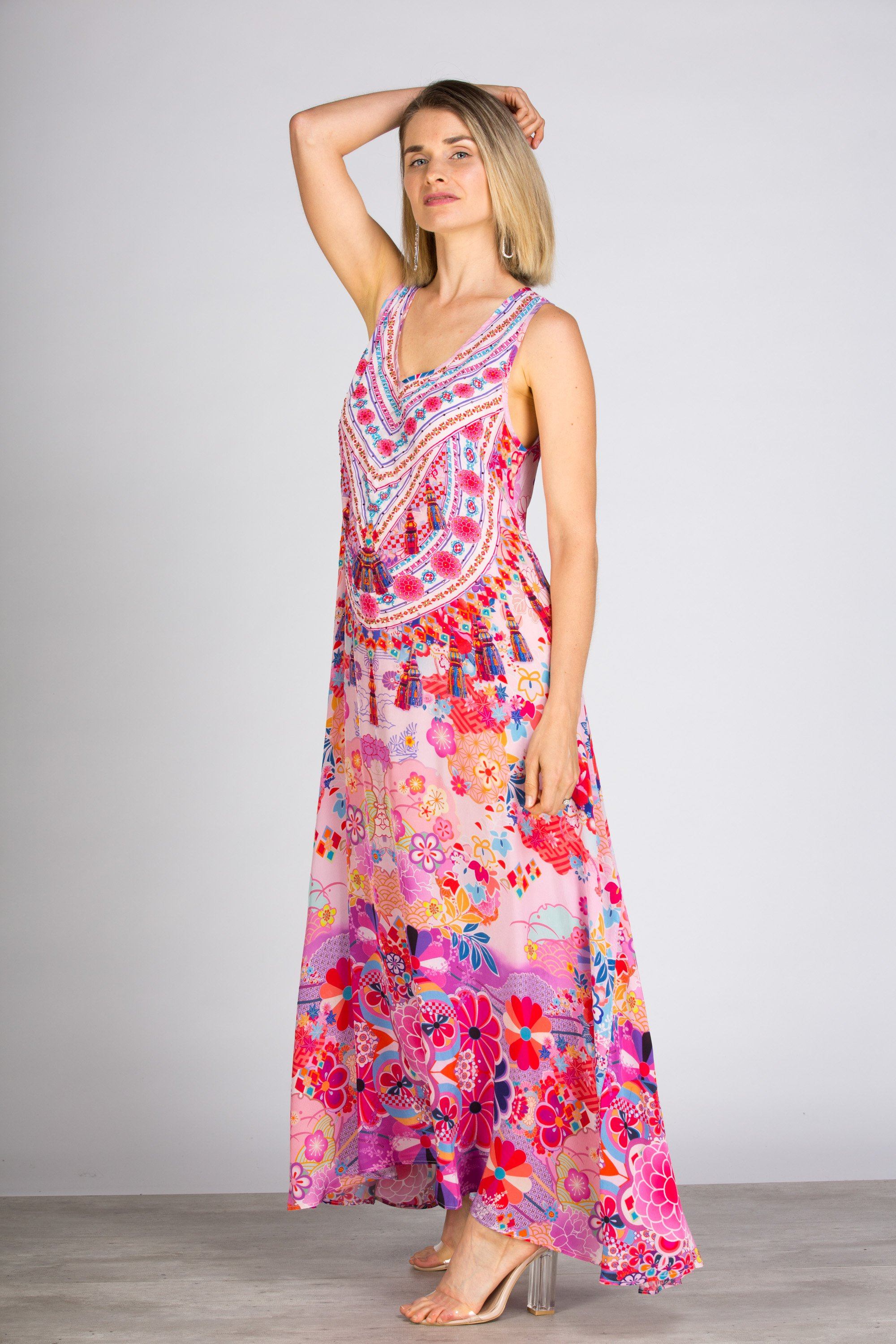 Posing Bondi Resortwear Cherry Blossom Flowing Maxi Dress presented as a radiant summer resort wear outfit in Australia