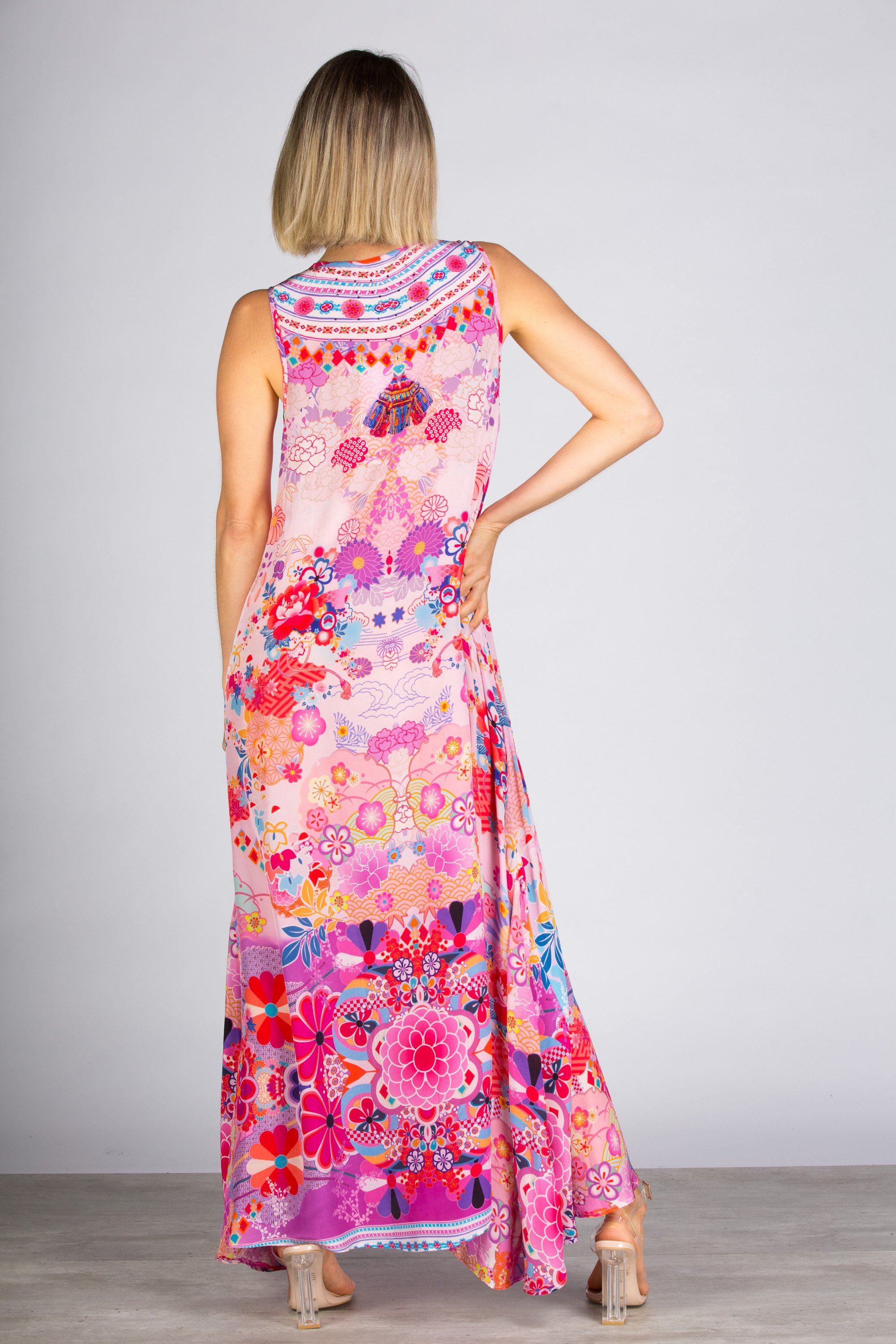 Back view of the Bondi Resortwear Cherry Blossom Maxi Dress highlighting its feminine flowing resort wear silhouette