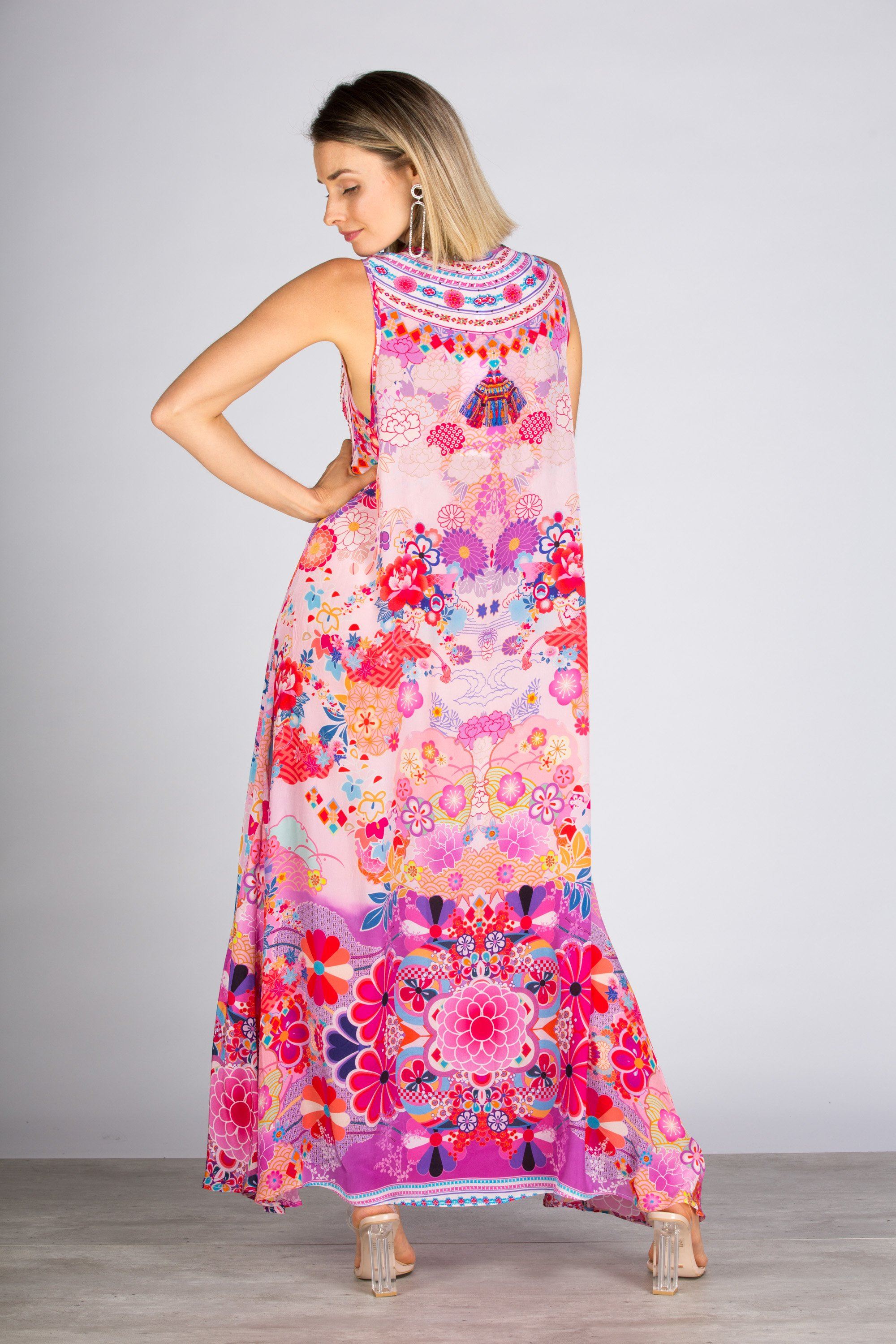 Bondi Resortwear Cherry Blossom Maxi Dress captured in a bright studio setting for coastal summer fashion