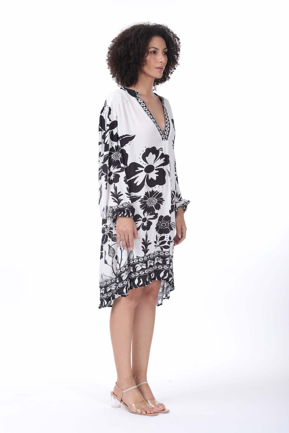 Side view of the black and white AVANTI Blouson Tunic Dress - Stylish Women's Outfit soft viscose fabric