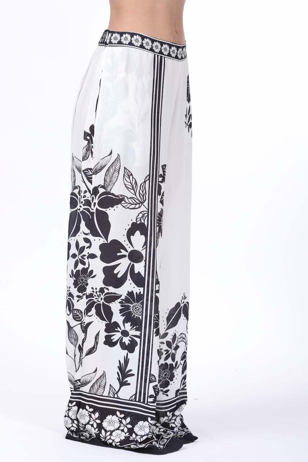 Side view of the black and white Avanti Ivy Pants - (TheSwankStore) with Premium Viscose Crepe fabric