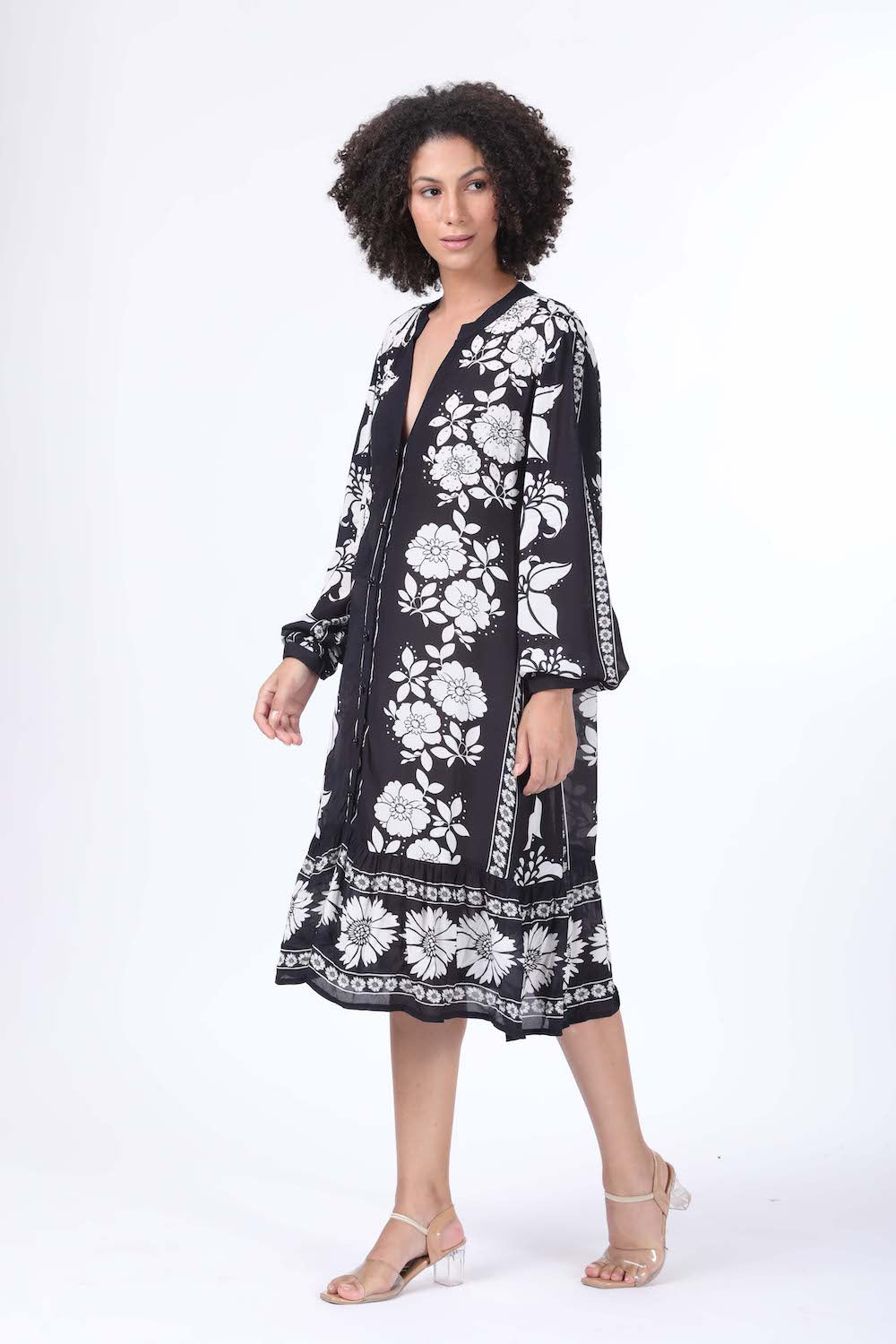 Left view of the black and white Avant Ava maxi dress in soft viscose fabric.