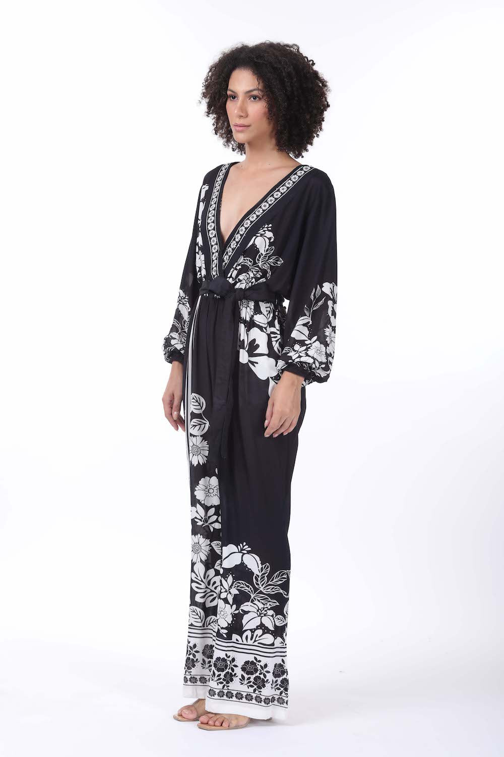 Side view of the black and white Avanti Luxe Jumpsuit (TheSwankStore) Viscose fabric