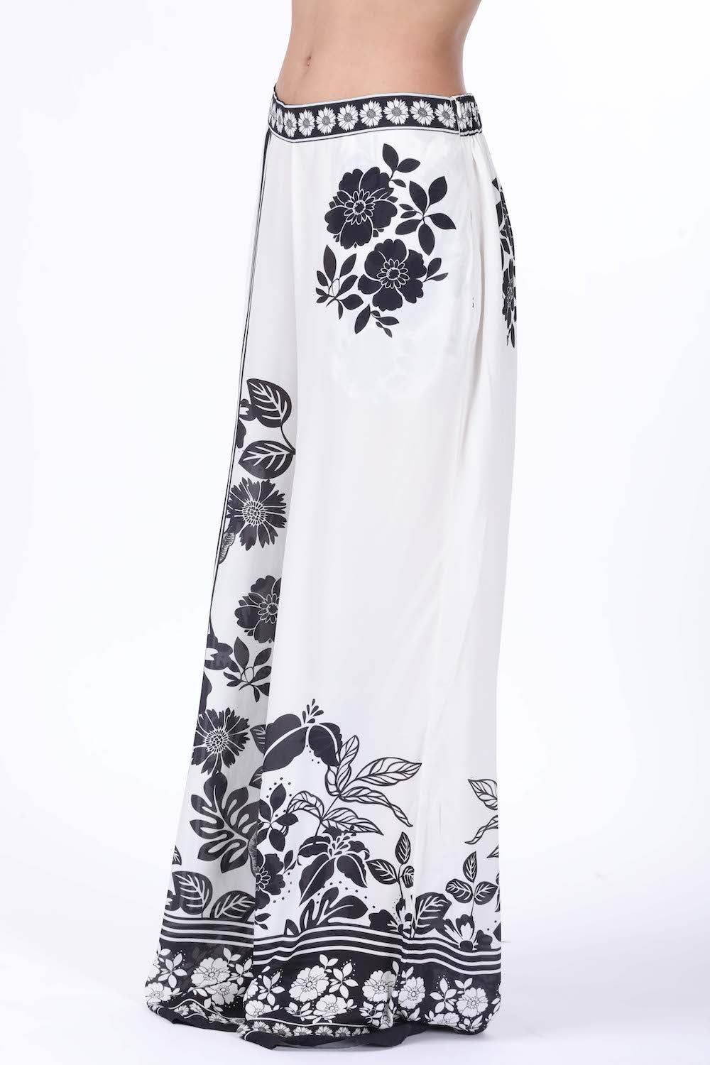 Side view of the black and white Avanti Ivy Pants - (TheSwankStore) with Premium Viscose Crepe fabric