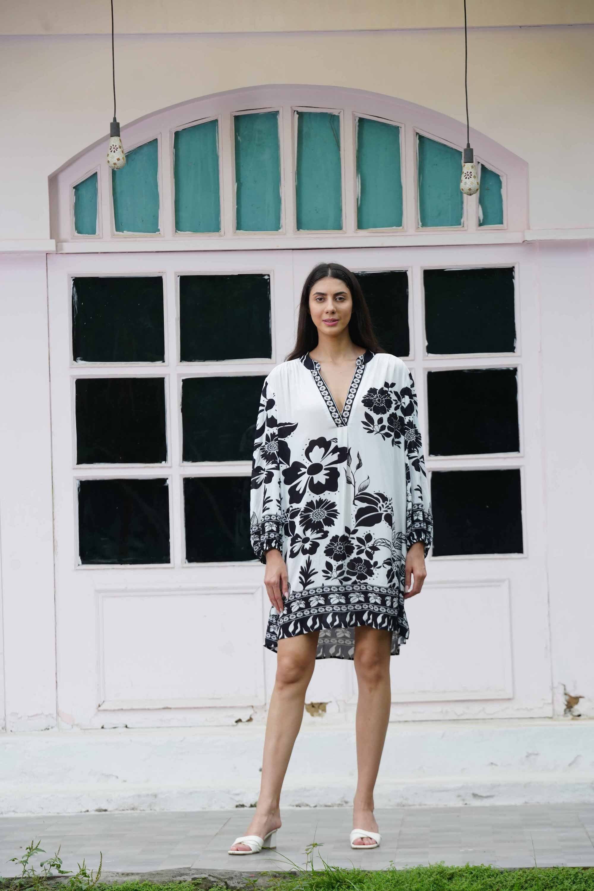 Front view of the black and white AVANTI Blouson Tunic Dress - Stylish Women's Outfit soft viscose fabric
