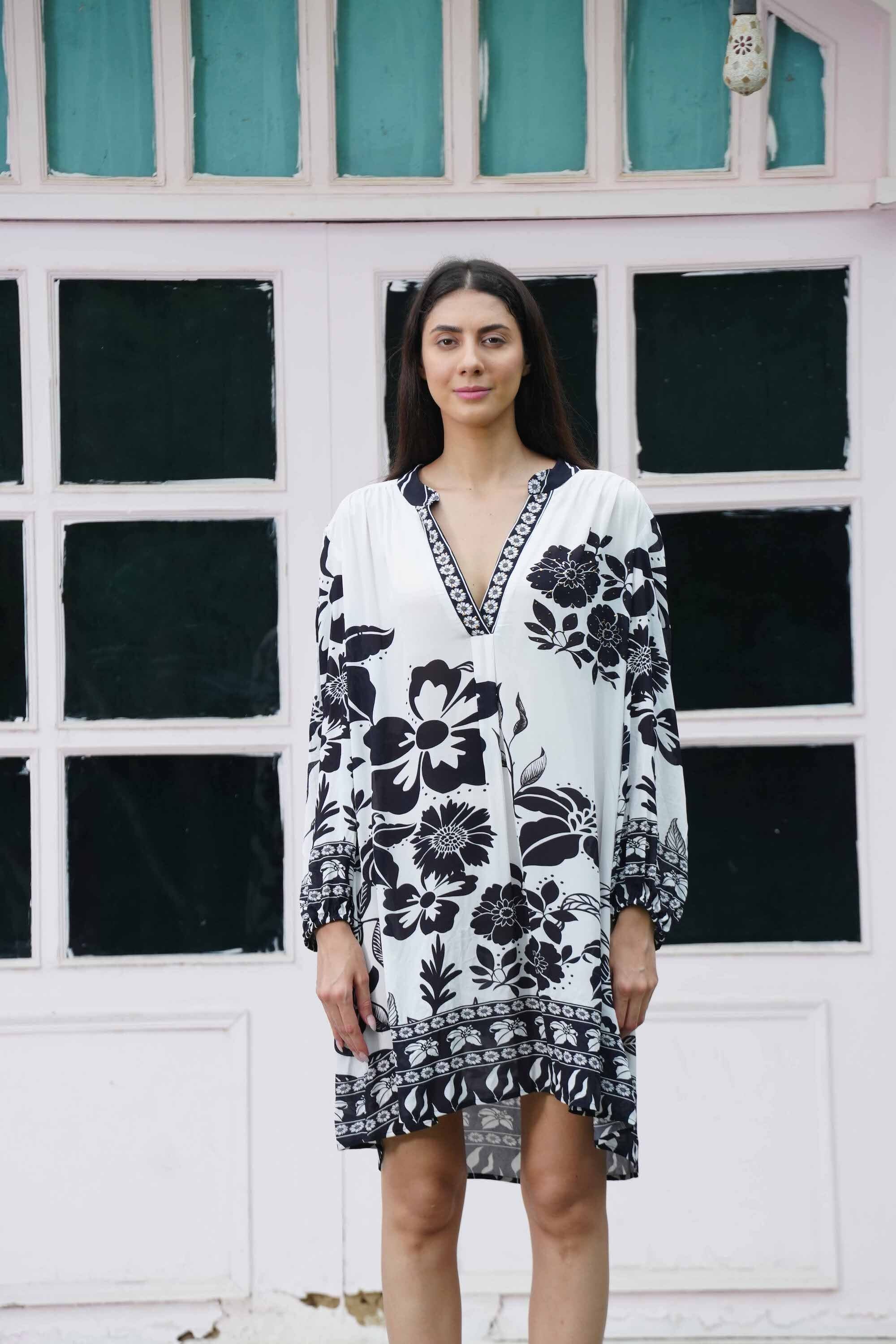 Front view of the black and white AVANTI Blouson Tunic Dress - Stylish Women's Outfit soft viscose fabric