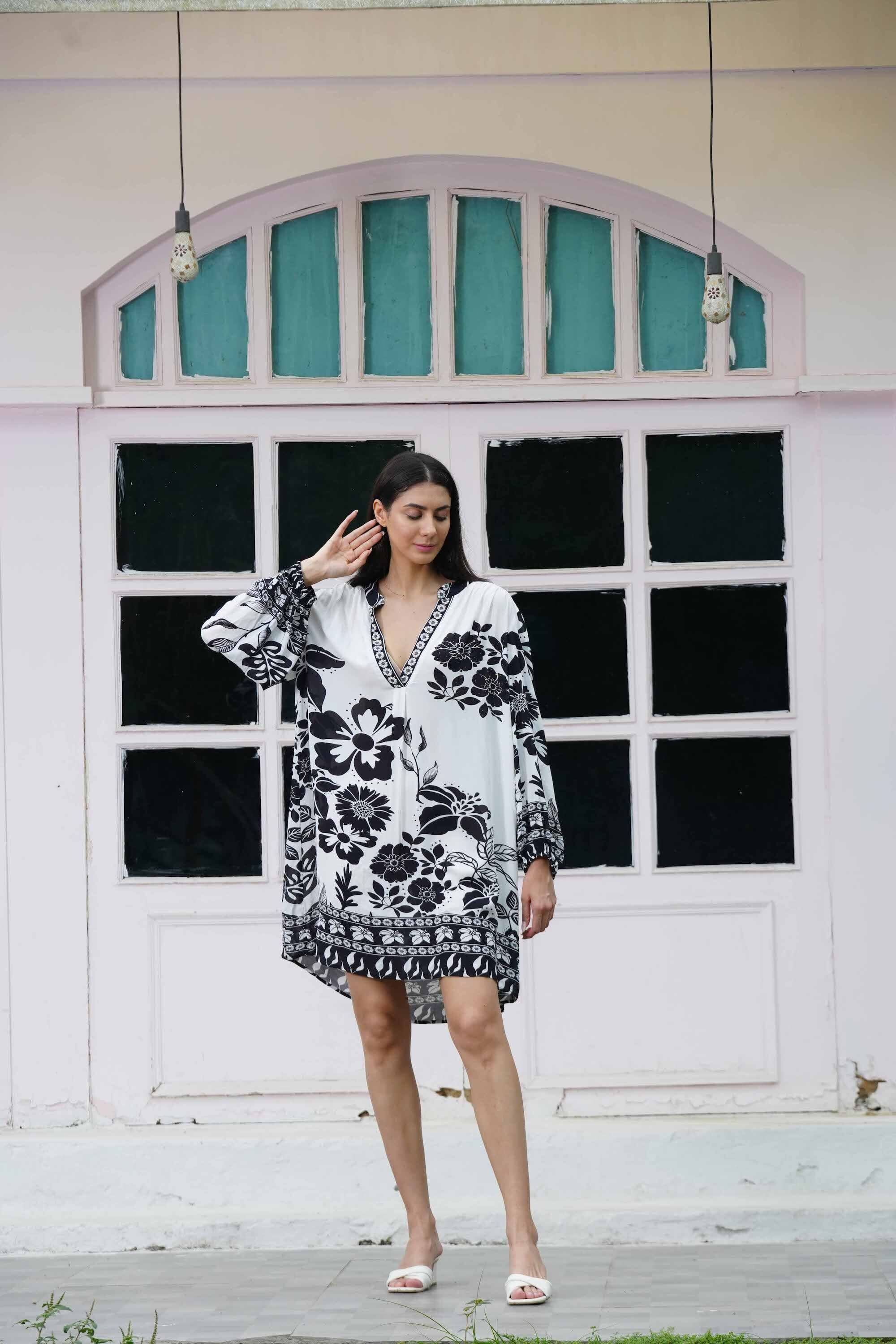 Front view of the black and white AVANTI Blouson Tunic Dress - Stylish Women's Outfit soft viscose fabric