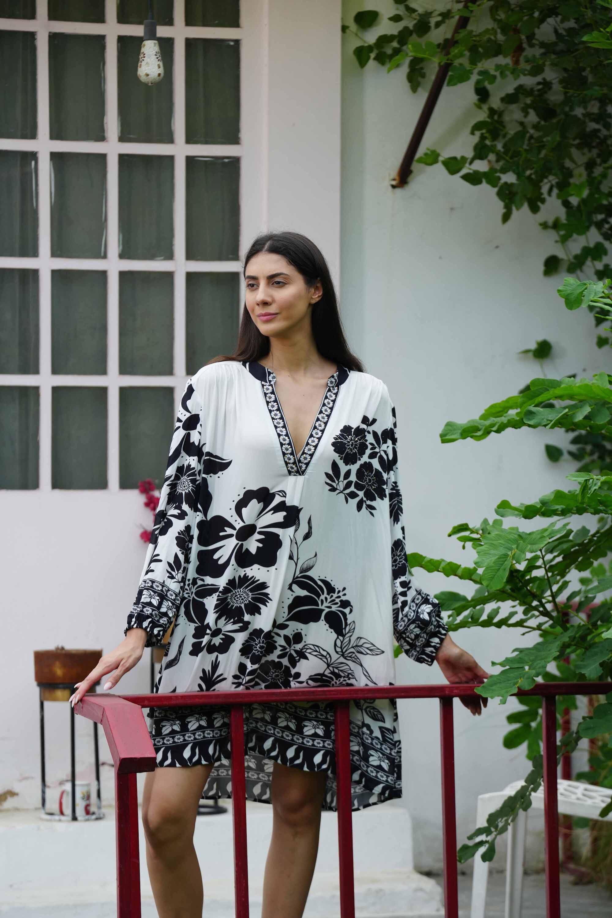 Front view of the black and white AVANTI Blouson Tunic Dress - Stylish Women's Outfit soft viscose fabric
