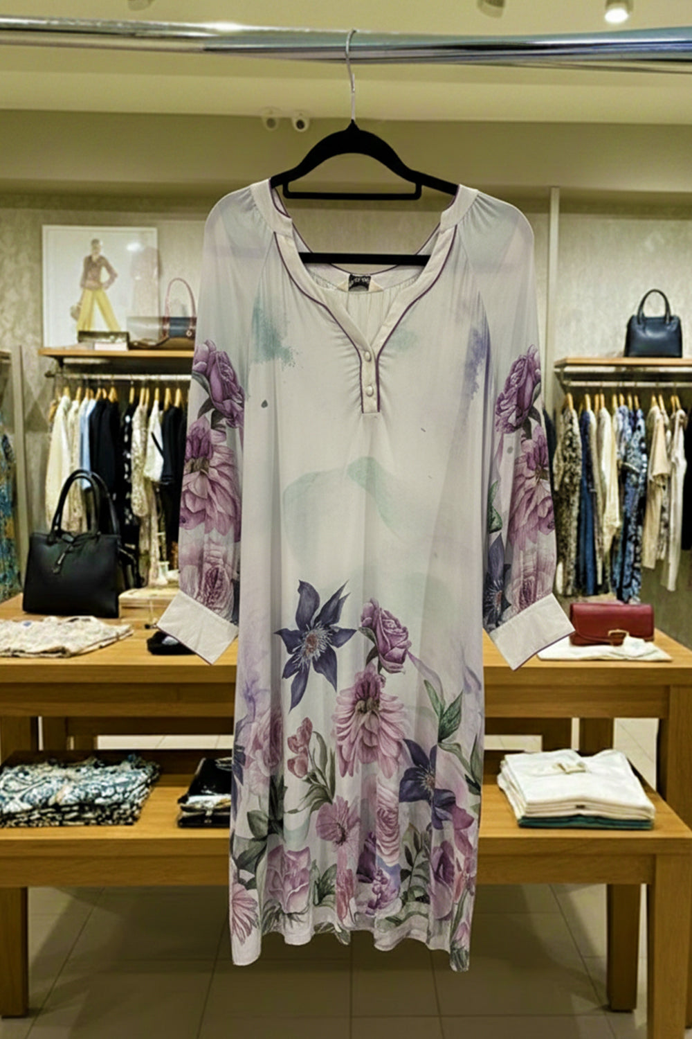 Bondi Resortwear Maric Floral Cynthia Long Tunic displayed on a hanger showcasing its vibrant floral prints and summer charm