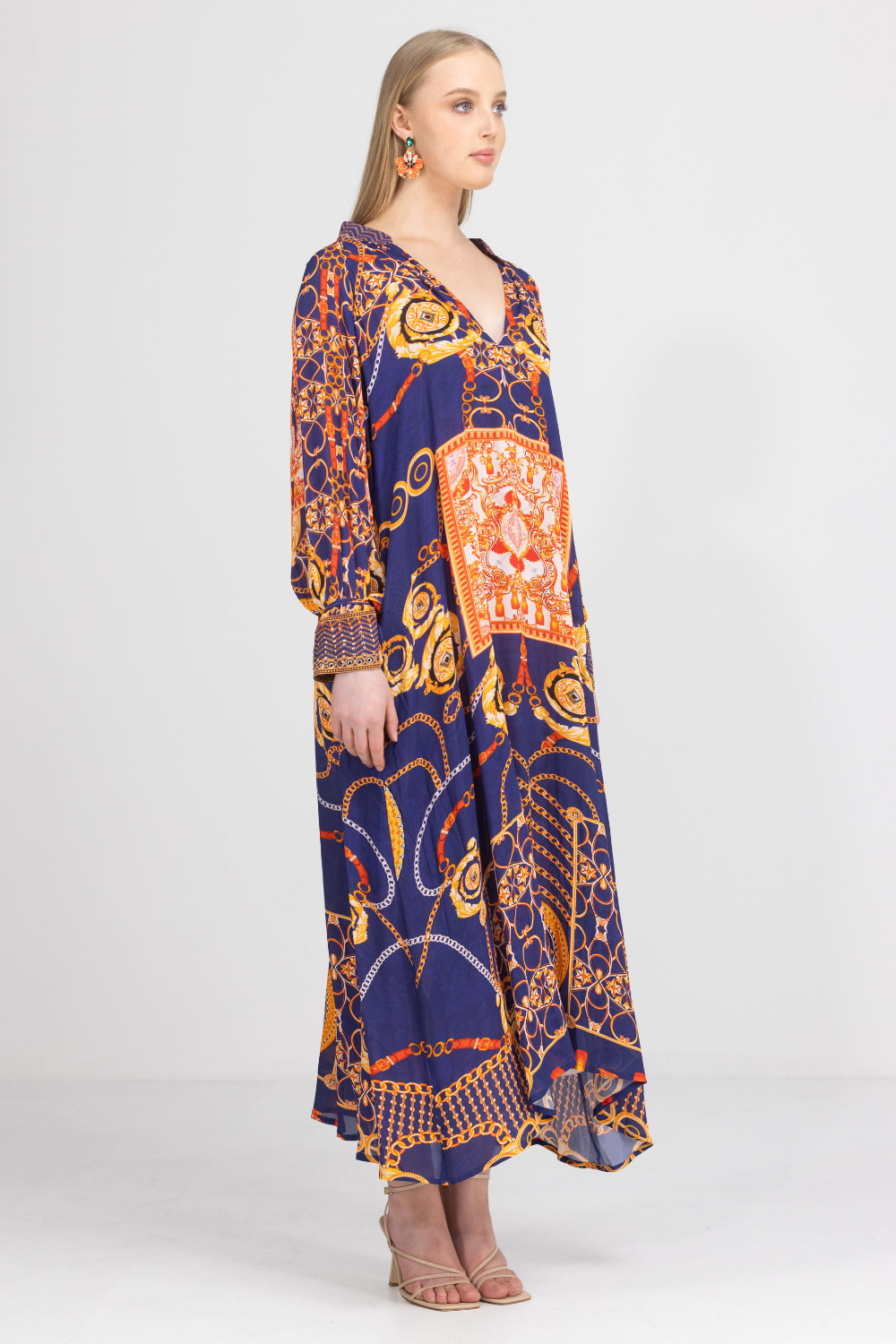 Side angle of the Bondi Resortwear Tempranillo Cynthia Tunic showing its relaxed flowing summer silhouette