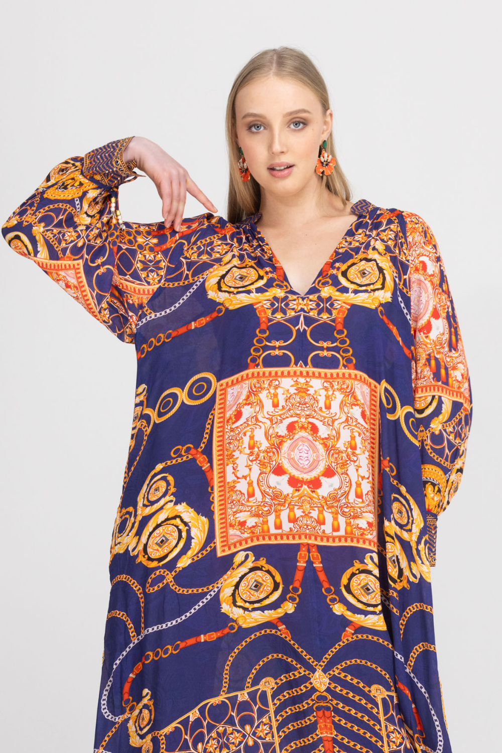 Close-up of the Bondi Resortwear Tempranillo Cynthia Tunic showcasing its vibrant prints and coastal charm