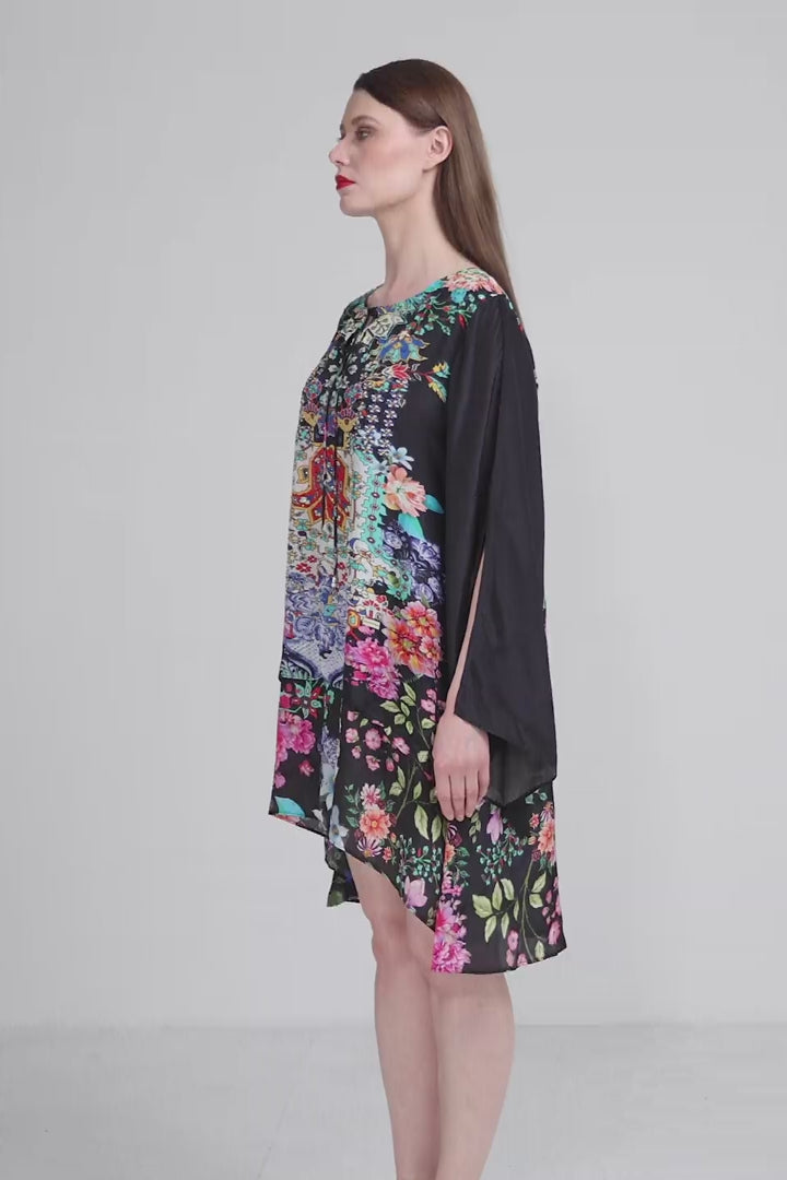 Side angle of the Bondi Resortwear Eden Layered Dress showing its soft flowing summer layers