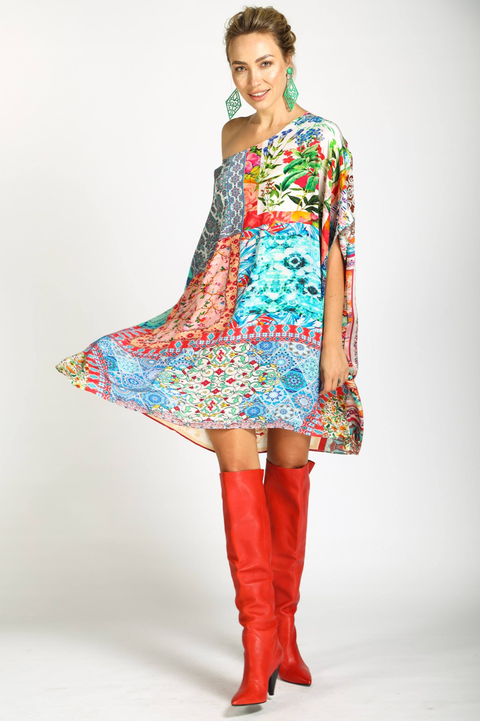 Style view of the flowy Dress A short kaftan dress, named Damascus, with a boxed, flowing silhouette. The patchwork pattern is composed of various mixed prints, designed for a relaxed fit. Available at Bondi / TheSwankStore.