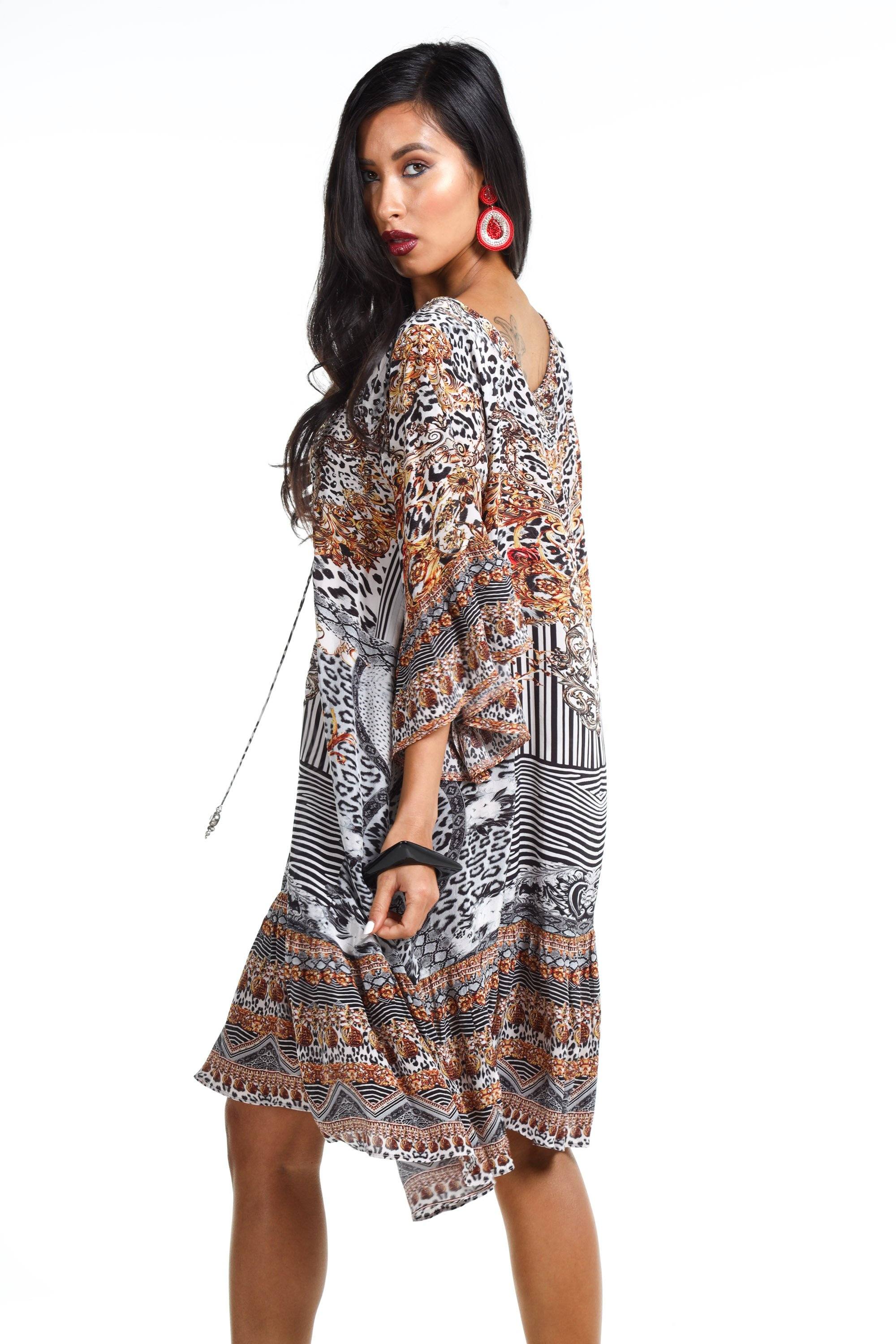 Side view of the Black, White & Orange Zaffari Gypsy Dress (TheSwankStore) Soft Viscose fabric